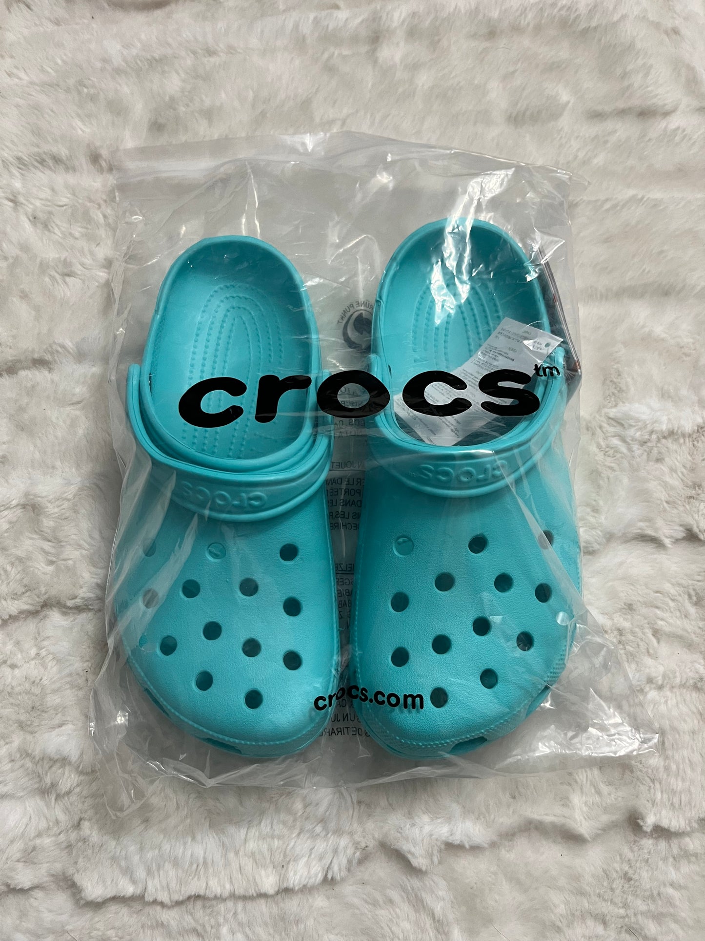 Turquoise Crocs