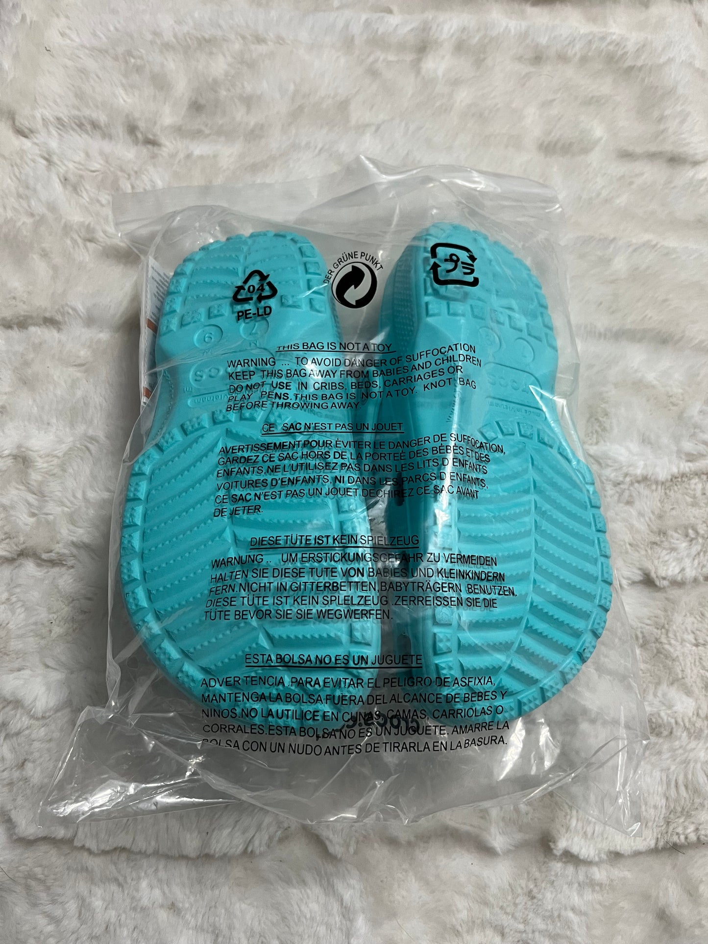 Turquoise Crocs