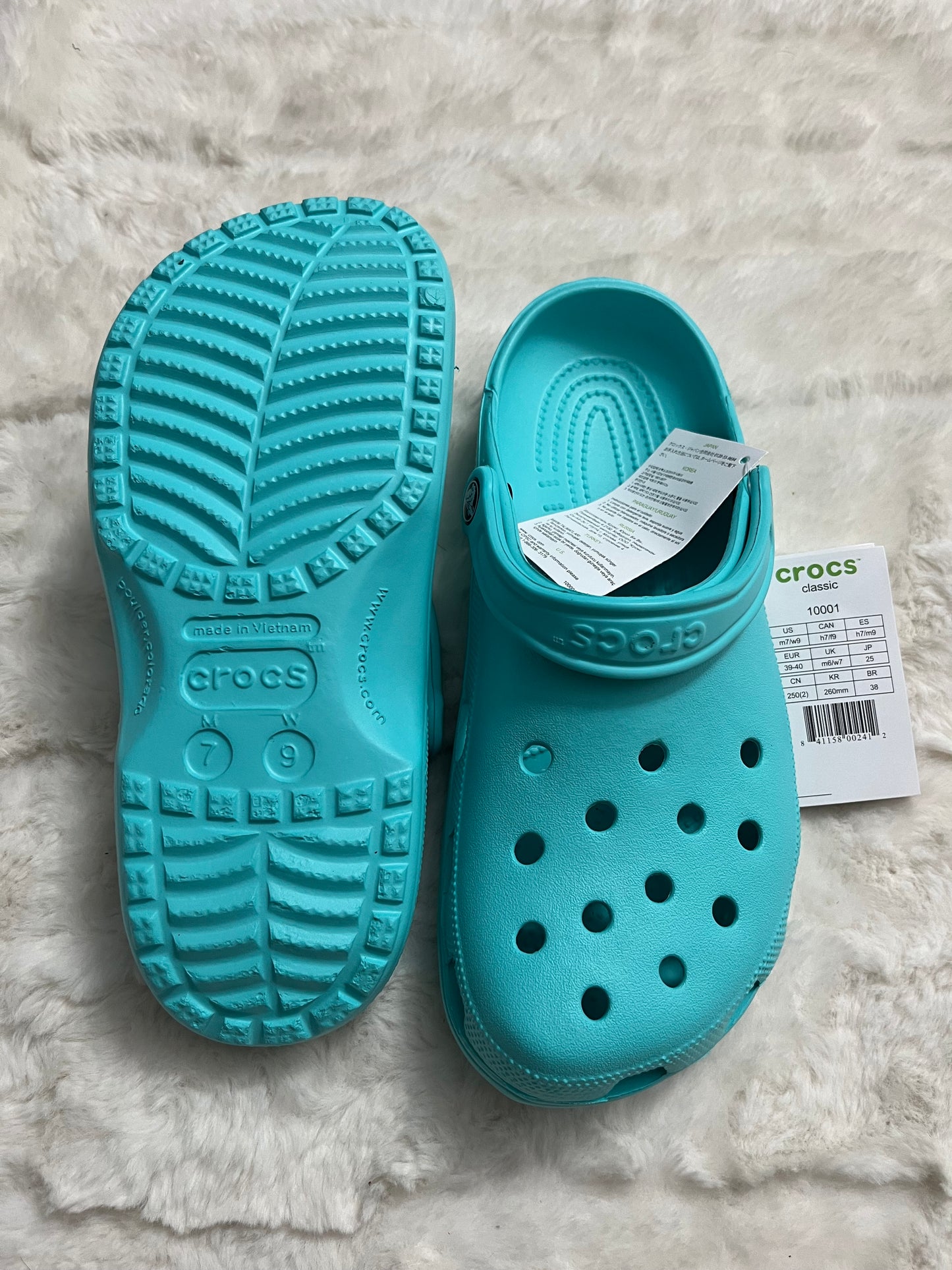 Turquoise Crocs