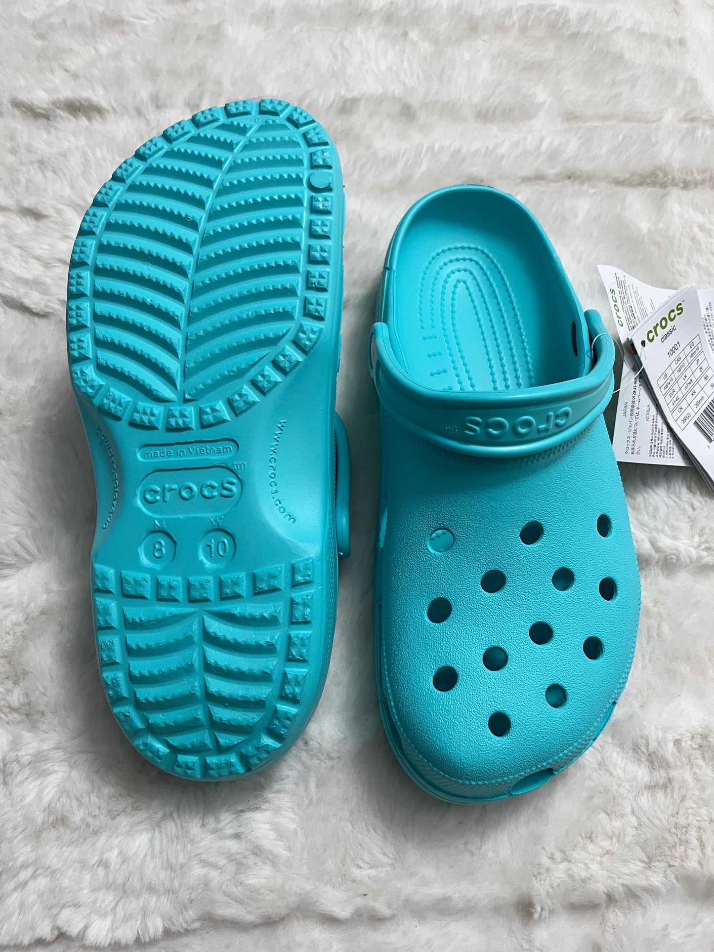 Turquoise Crocs