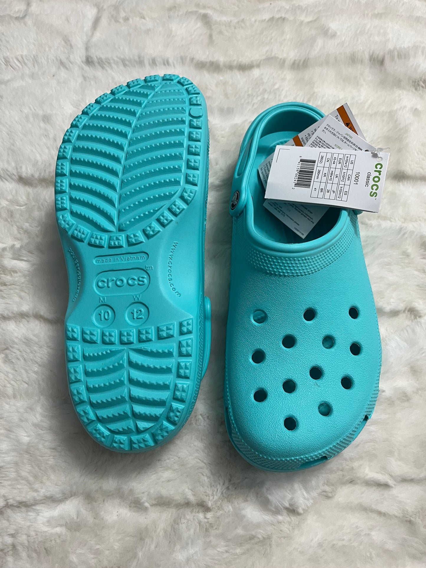 Turquoise Crocs