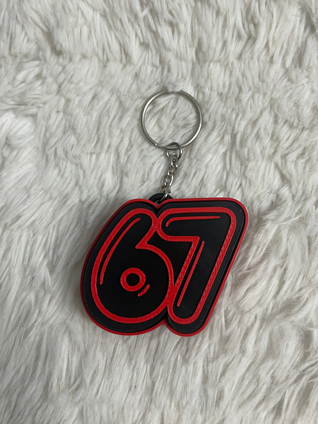 67 Clicker Keychain